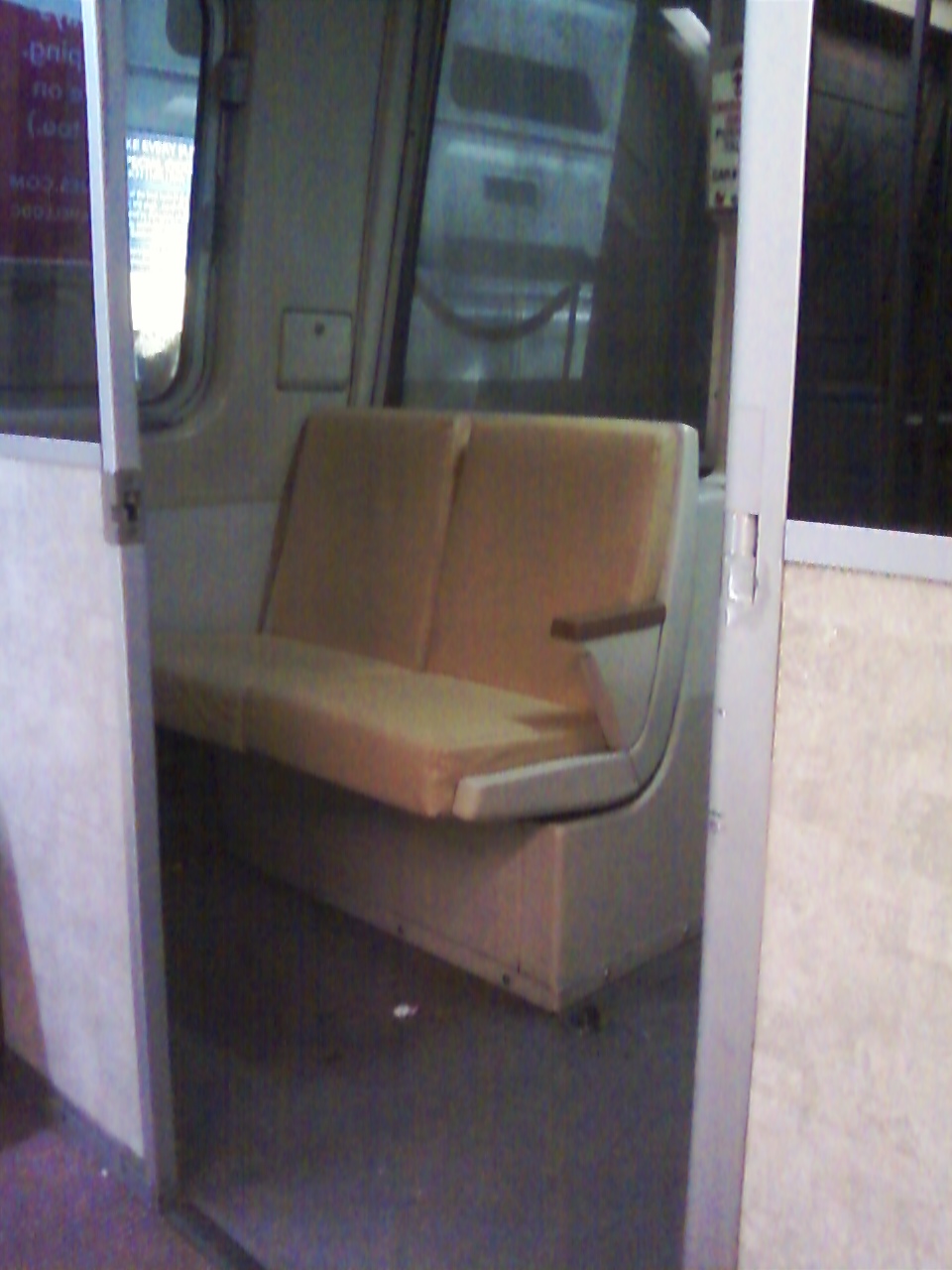 Another view
of WMATA/DC Metro 'private section' of car 1183 (half of motorman's cab
which provides seating when not in use to operate the train), offering a
very private ride. Car 1183's private section even offers new carpeting
for a quieter ride! :) For further details, please visit
www.wirelessnotes.org.